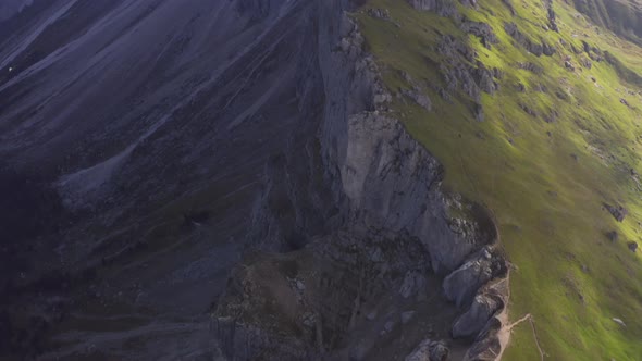 Revealing Aerial Shot of Lush Scenery in Scenery with the Peak Covered in Fog