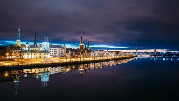 Riga, Latvia. Time Lapse Timelapse Time-lapse Of Cityscape In Morning Sunrise Time. Night View Of