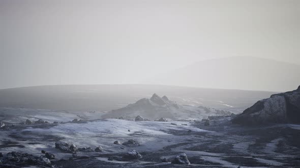 Antarctic Mountains with Snow in Fog