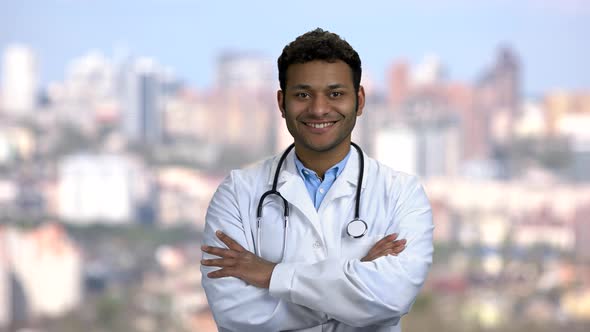 Happy Male Doctor Looking at Camera