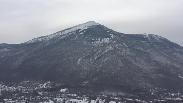 Winter scene with Eastern Serbian Rtanj mountain 4K drone video