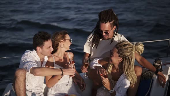 High Angle View of 4 Friends or Couples Spend a Weekend on a Yacht