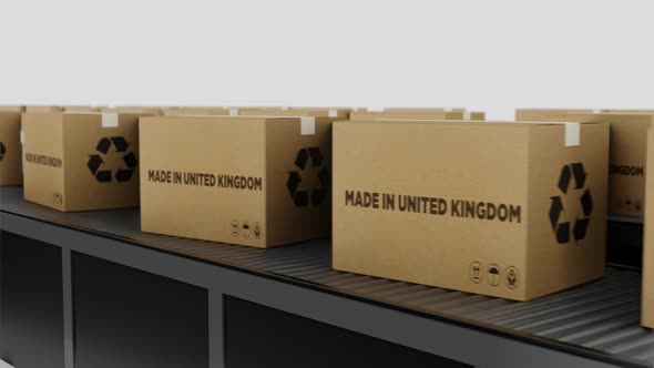 Boxes with MADE IN United Kingdom Text on Conveyor