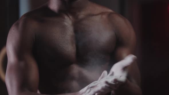 Gym Training  Black Shirtless Athlete Young Man Clapping Hands Covered in Chalk