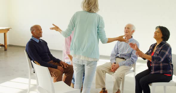 Senior therapist interacting with the patients 4k