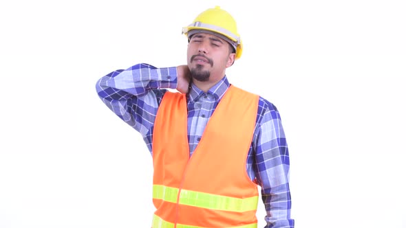 Stressed Bearded Persian Man Construction Worker Having Neck Pain