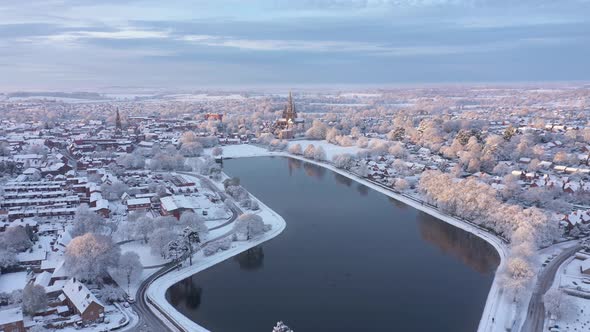 Aerial view of snow covered city in winter in UK