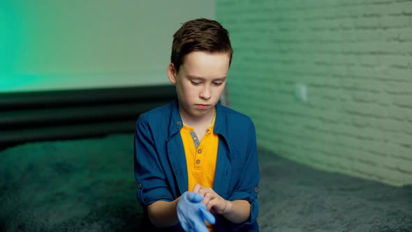 Boy wearing a protection gloves