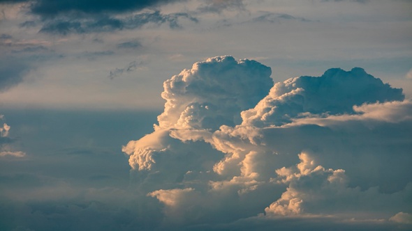 Timelapse of beautiful air clouds at sunset alt