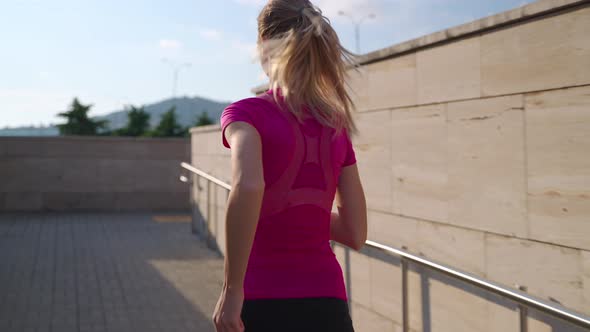 Active Sporty Woman Jogging in the Morning