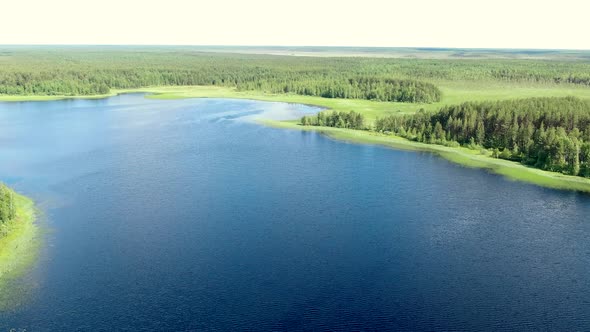 Flight Over the Taiga Forest Lake