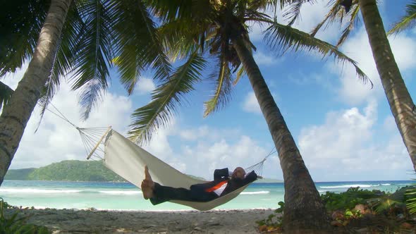 Young Businessman in Hammock