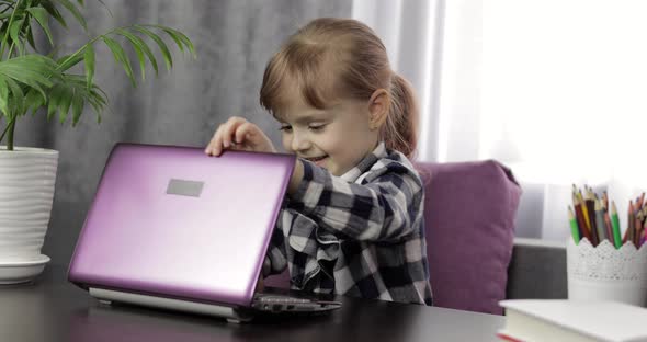 Girl Studying Online Lessons Using Digital Laptop Computer. Distance Education