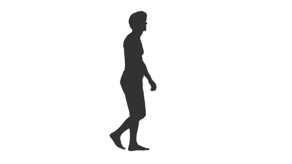 Silhouette of Walking Man Tourist in Shorts with Naked Torso