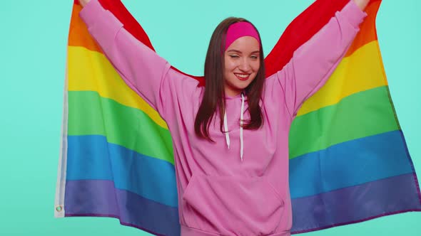 Cheerful Cute Girl Smiling with Rainbow LGBT Flag Celebrate Parade Show Tolerance Same Sex Marriages