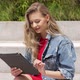 Young Woman Using Tablet on Street - VideoHive Item for Sale