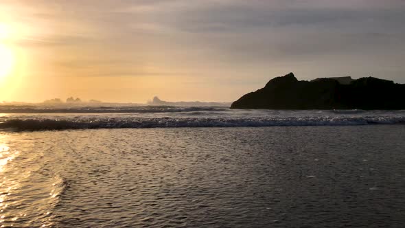 Outgoing tide at Southern Oregon beach at sunset
