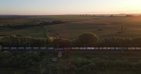 Freight Train Moves At Sunset