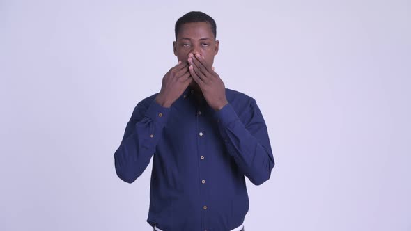 Young Handsome African Businessman Showing Speak No Evil Concept