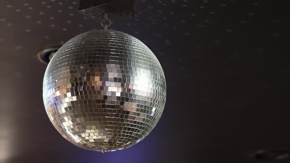 Rotating Disco Ball on the Ceiling of the Room