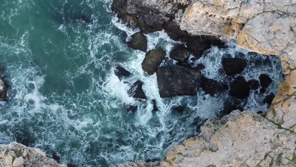 Aerial View of Sea Waves and Fantastic Cliffs Rocky Coast