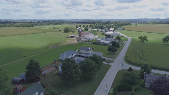 Aerial View of Amish Church Meeting with Horse and Buggies