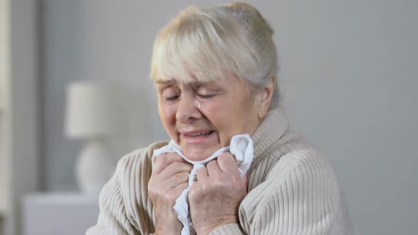 Lonely Abandoned Depressed Elderly Woman Crying Desperately in Nursing Home