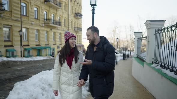 Happy Romantic Couple on a Date at Sunny Winter Day