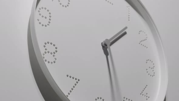 Dotted White Clock Face on Wall All Day