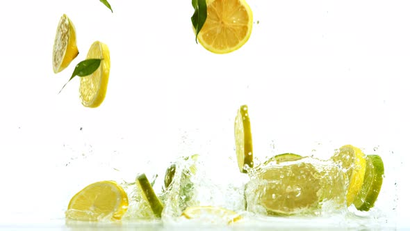 Fresh Citruses Dropped Into Water with Splash Shooted with High Speed Cinema Camera at 1000 Fps