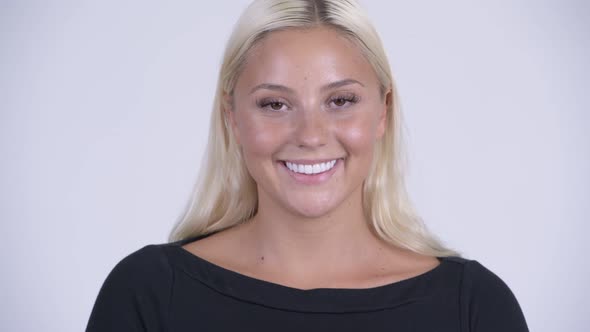 Face of Young Happy Blonde Woman Smiling