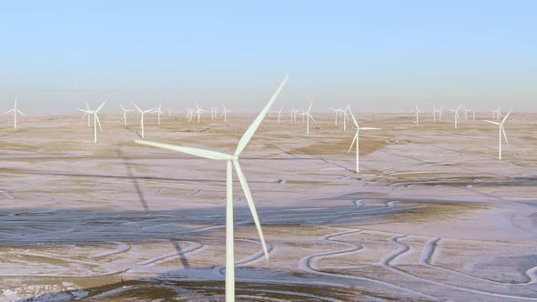 Aerial shots of wind turbines on a cold winter afternoon in Calhan, Colorado