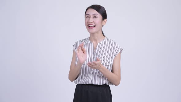 Happy Beautiful Asian Businesswoman Clapping Hands