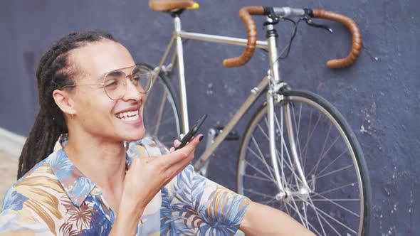 Mixed race man talking on the phone