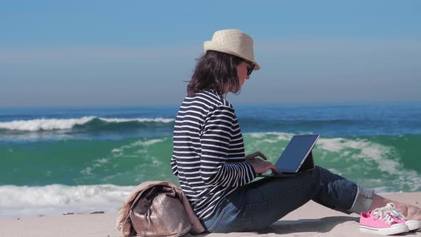 Woman Chatting Online on Beach Work Outside