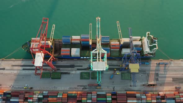 Aerial View of the Container Terminal of the Seaport of the City of Valencia and the Ship During