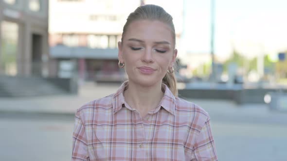 Rejecting Young Woman in Denial Standing Outdoor