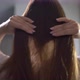 Young Woman Brushes and Touching Her Hair - VideoHive Item for Sale