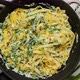 Homemade Tagliatelle Pasta with Ricotta Cheese Creamy Sauce and Fresh Asparagus Served on a Iron Pan - VideoHive Item for Sale