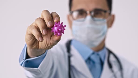 Lab Technician Assistant Shows Covid-19 Virus Cell in Clinic Laboratory