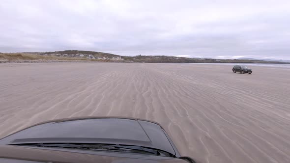 Driving on Rossnowlagh Beach in County Donegal Ireland
