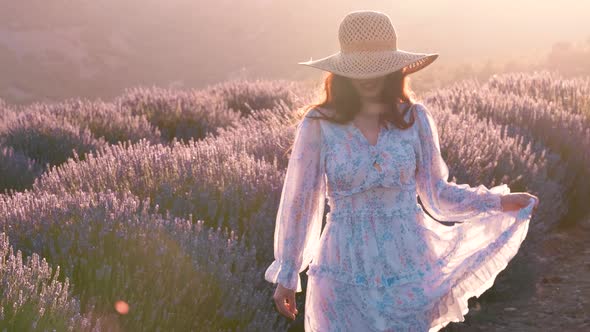 Girl on the Lavender Field at Sunset