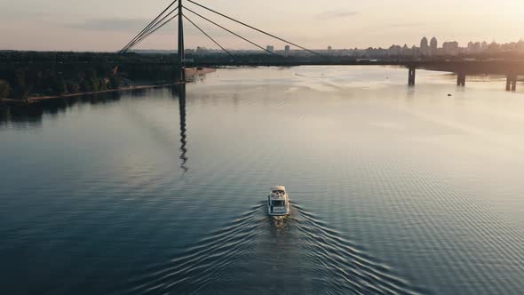 Big White Motorboat Yacht Cruising Sunset River