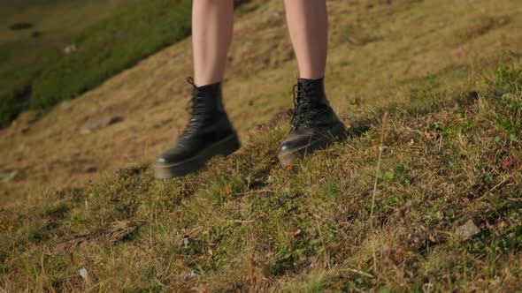 Hiker Girl Making Her Way Down the Hill