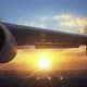 Camera Moving Close to Large Airplane Wing Showing its Engines Rotating - VideoHive Item for Sale