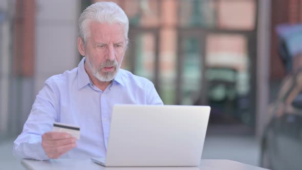 Outdoor Old Man Shocked By Payment Failure