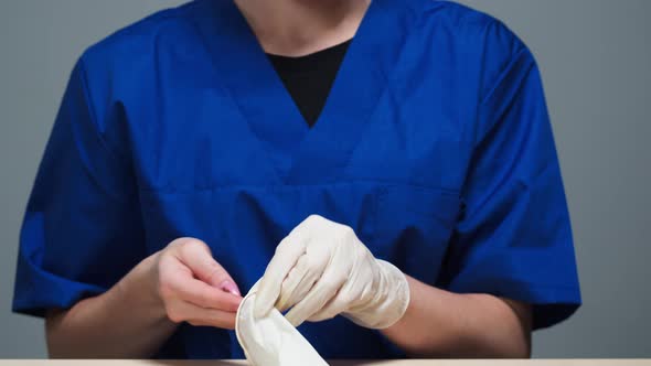 Doctor Putting on Medical White Gloves the Surgeon Preparing for Operation the Nurse Wearing