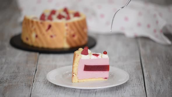 Piece of Layered Raspberry Mousse Cake