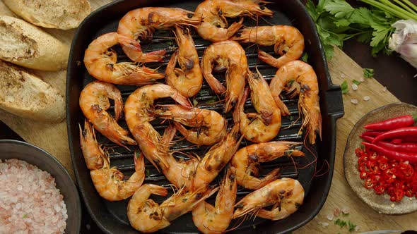 Grilled Shrimps in Cast Iron Grilling Pan with Fresh Lemon, Parsley, Chili, Garlic White Wine Sauce