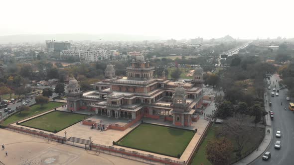 Majestic Albert Hall Museum in center of Jaipur encircled by busy Indian traffic, in Rajasthan